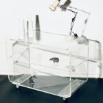 an old fashion 1980s perspex side table