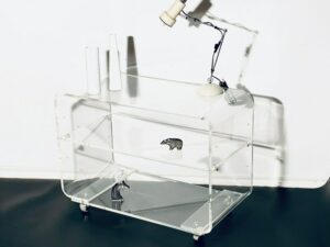 an old fashion 1980s perspex side table